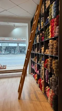 Shelves of colourful yarn in a local yarn shop